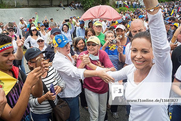 The leader of the Vente party  Maria Corina Machado  in the march of the opposition. Opposition march on Wednesday  May 4  in rejection of the 'constitutional fraud'.