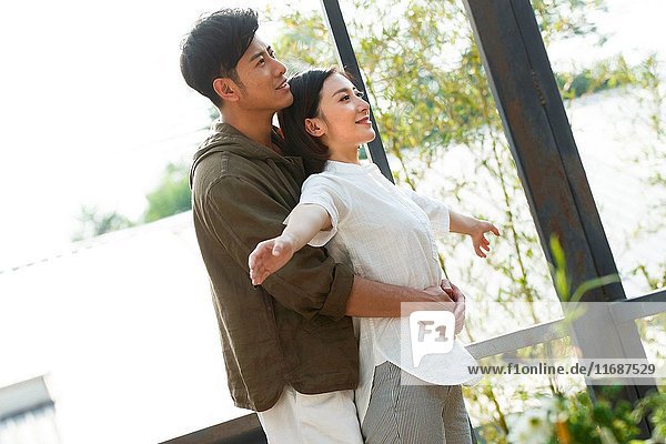 Young couple at balcony