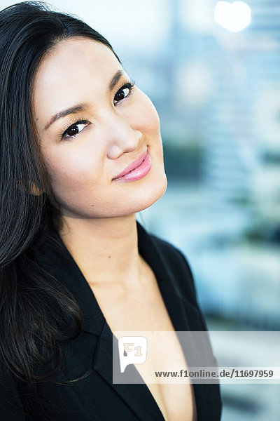 Portrait of smiling Asian woman