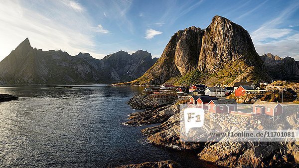 Norway Nordland Lofoten islands Moskenesoy island the fishing village of Hamnoy traditional fishermen cabins built on stilts (rorbu rorbuer) at sunset.