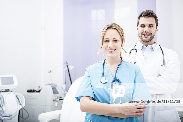 Portrait of two smiling doctors in medical practice