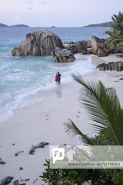 Couple at the beach  La Digue  Indian Ocean  Seychelles  Africa