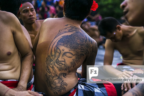 'Traditional Kecak ritual also called Fire Dance; Uluwatu Bali Island Indonesia'