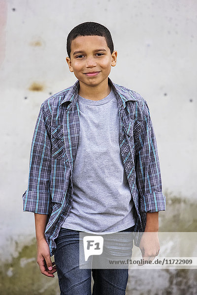 'Portrait of a young boy walking towards the camera; Oregon  United States of America'