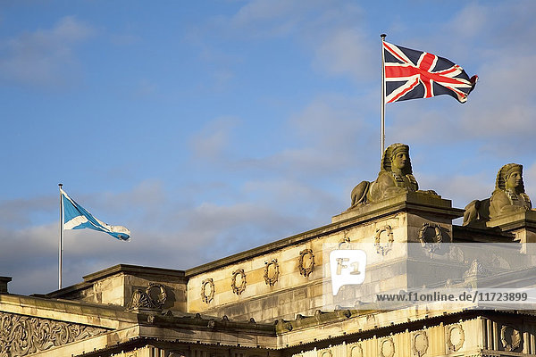 'Union Flag And Flag Of Scotland On Top Of A Building; Edinburgh Scotland'