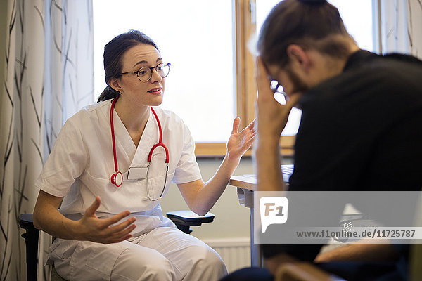 Doctor examining patient