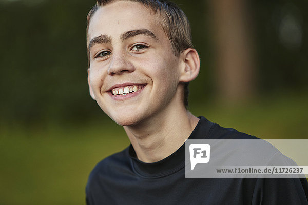 Portrait of smiling teenager looking at camera