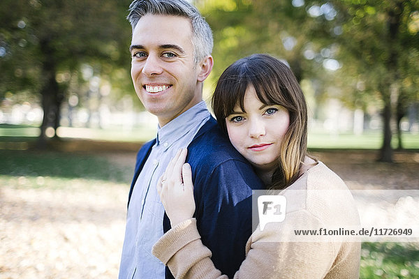 Portrait of smiling couple in park
