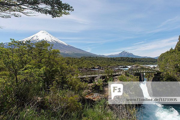 The Petrohue Rapids and Osorno Volcano in Vicente Perez Rosales National Park near Puerto Varas and Puerto Montt in the Lake District in southern Chile.