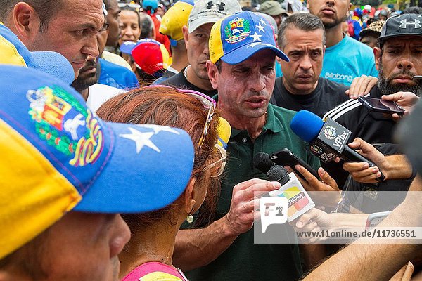 State Governor Miranda  Henrique Capriles Radonski  makes statements to the press on the march. MUD (Bureau of Unity) marches along with thousands of Venezuelans against the Constituent Assembly in Caracas. May  8. 2017.