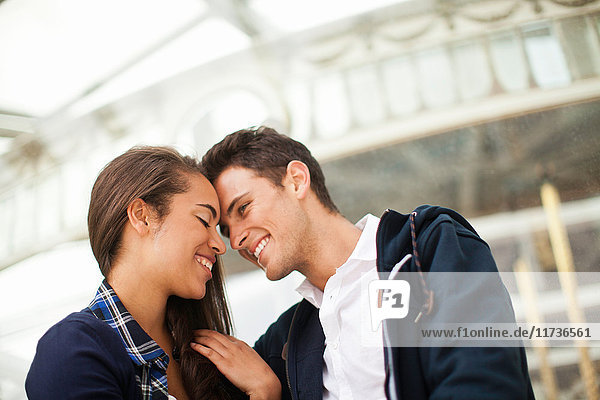 Young couple face to face  smiling