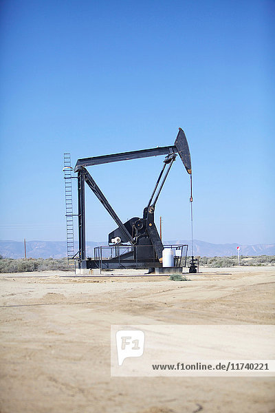Derricks in oil well  California