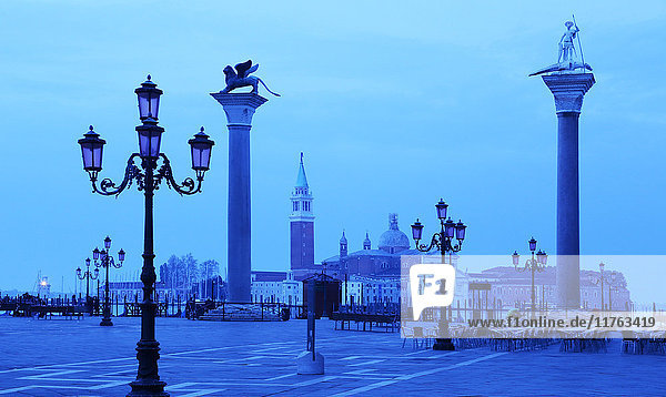 Doge's Palace and Piazzetta against San Giorgio Maggiore in early morning light  Venice  UNESCO World Heritage Site  Veneto  Italy  Europe