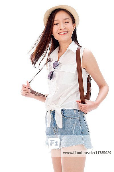 Portrait of young woman with backpack