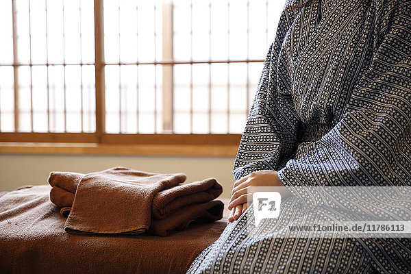Japanese woman wearing a yukata at traditional ryokan  Tokyo  Japan