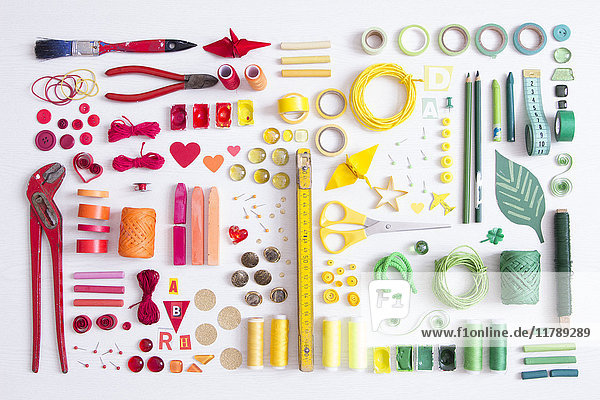 Tools  craft and painting materials on white ground