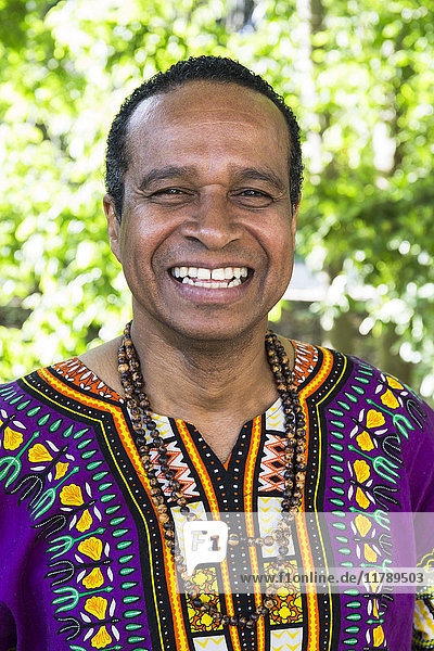 Portrait of laughing man wearing traditional Brazilian clothing