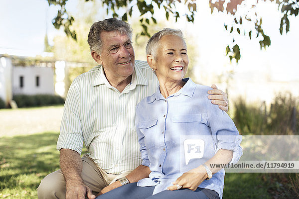 Happy senior couple in garden