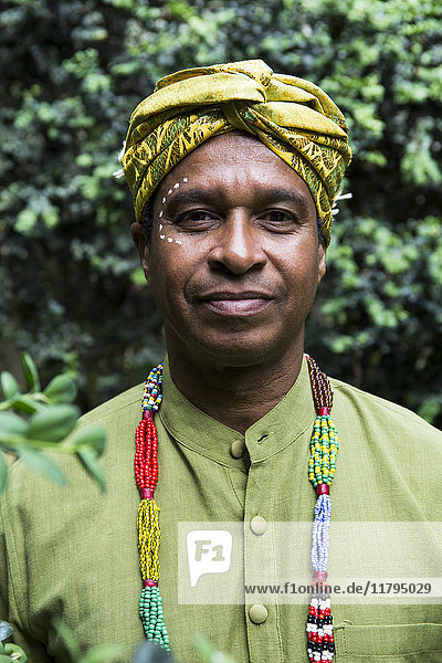 Portrait of content man wearing traditional Brazilian clothing