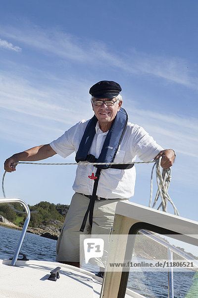 Senior man on boat