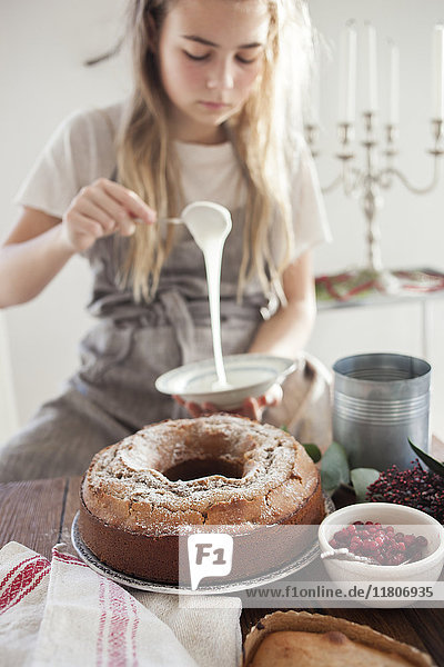 Girl baking a cake