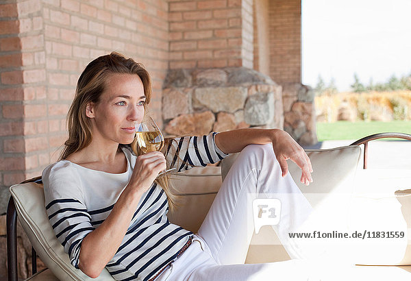 Woman enjoying wine on the terrace