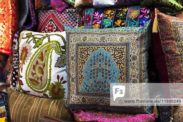 'Colourful decorative cushions on display at the Arab Market; Jerusalem  Israel'