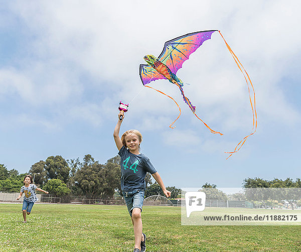 Boy flying kite