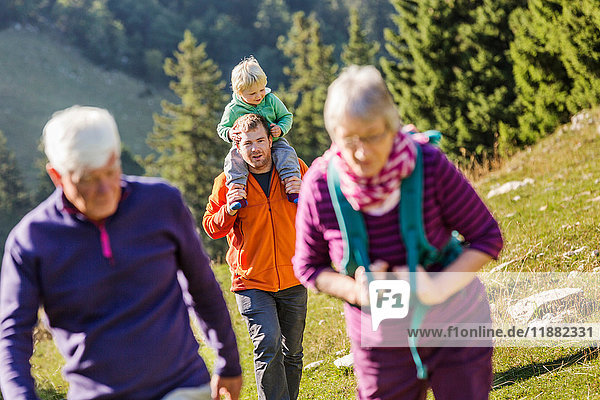 Three generation family  hiking  in rural setting  Geneva  Switzerland  Europe