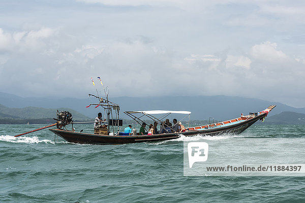 'A traditional boat carries passengers across the Gulf of Thailand; Ko Samui  Chang Wat Surat Thani  Thailand'