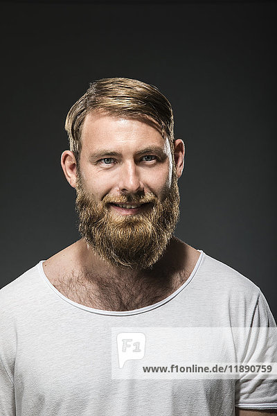 Portrait of smiling man with full beard