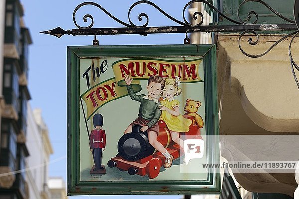 Children riding on a toy-train  painted sign at Toy Museum  Toy Museum  historic centre  Valletta  Malta  Europe
