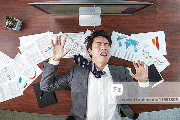 Top view of Japanese businessman in the office