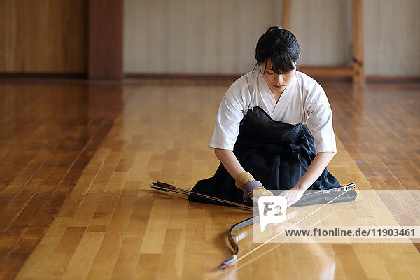 Japanese traditional archery athlete practicing