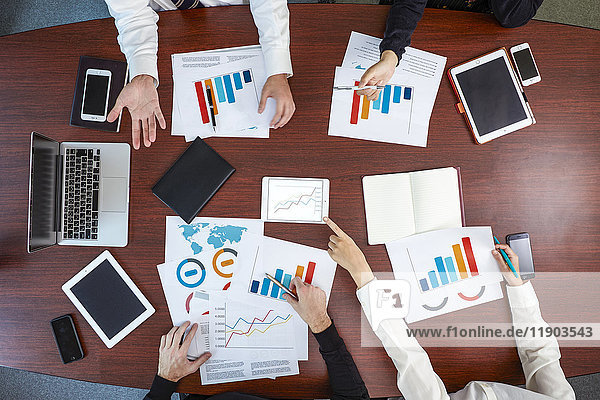 Multi-ethnic group having a business meeting