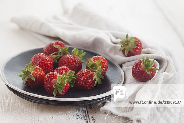 Ein Teller mit Erdbeeren
