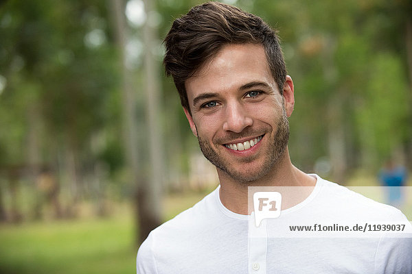 Young man smiling cheerfully  portrait