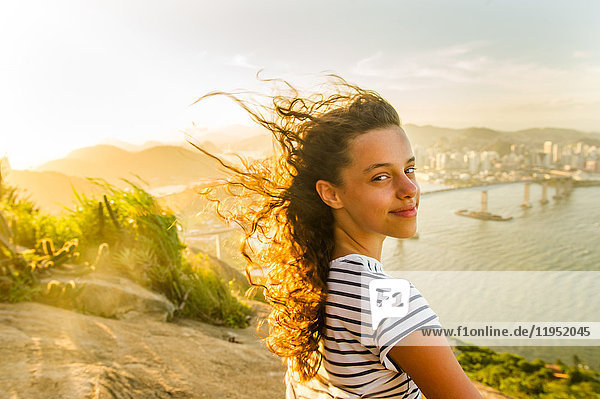 Girl at view point during sunset  Rio de Janeiro  Brazil