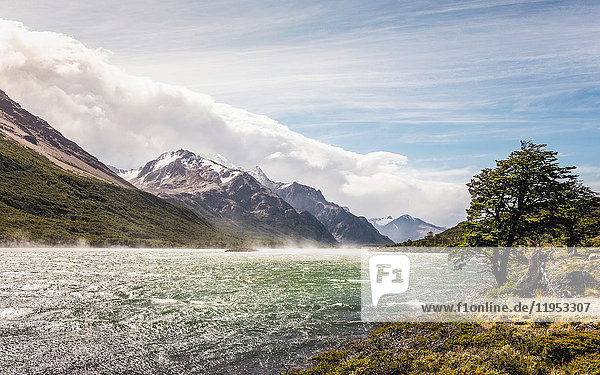 Misty river in mountain valley in Los Glaciares National Park  Patagonia  Argentina