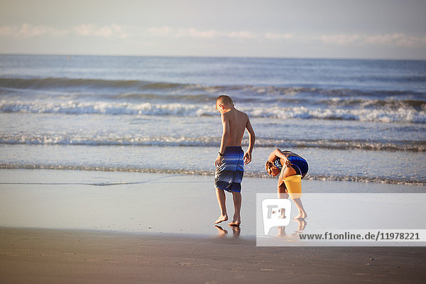Girl and boy on beach  North Myrtle Beach  South Carolina  United States  North America