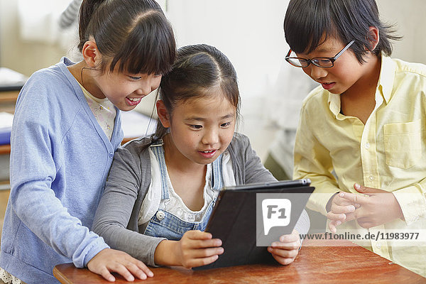 Japanese elementary school kids in the classroom