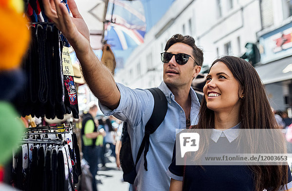 UK  London  Portobello Road  couple on a shopping spree