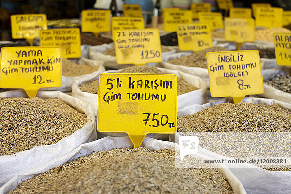 Spices in sacks with prices at market