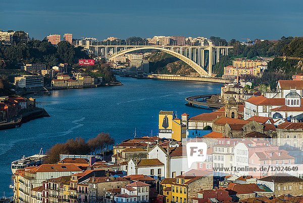 Aerial view in Porto city with Arrabida Bridge over Douro River between Porto and Vila Nova de Gaia  Portugal.