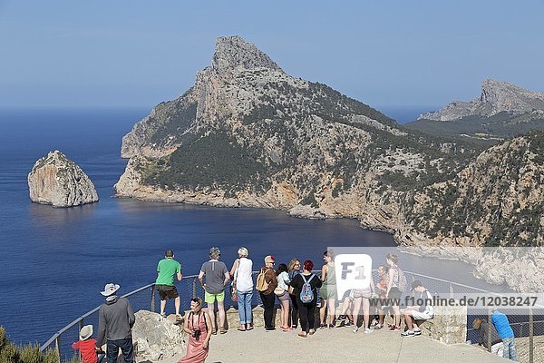 Tourists at the viewpoint  Mirador d' Es Colomer  also Mirador del Mal Pas  Peninsula Formentor  Majorca  Spain  Europe