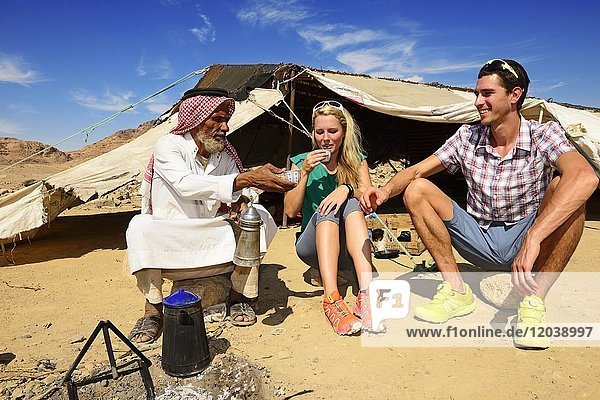 Bedouin preparing coffee with pan-roasted beans and kardamom  Jordan  Asia
