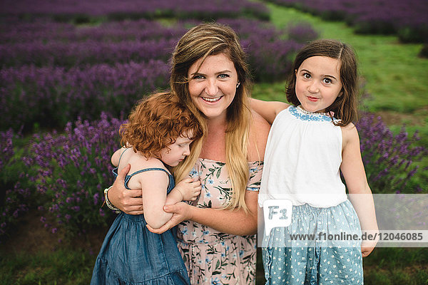 Mother and daughters in lavender field  Campbellcroft  Canada