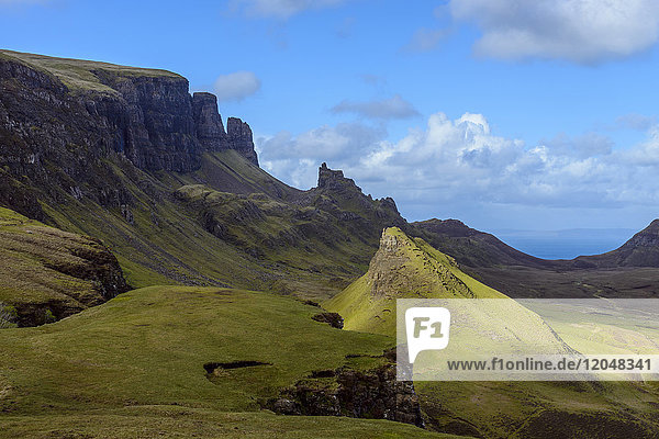 Grassy cliffs and mountain landscape on the Trotternish Peninsula on the Isle of Skye  Scotland  United Kingdom