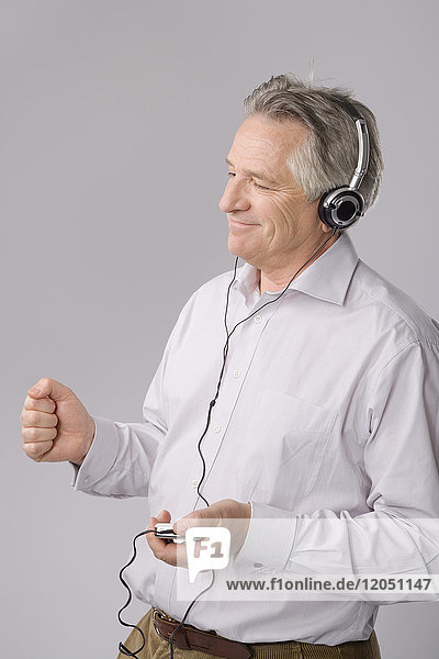Portrait of Man Listening to Music