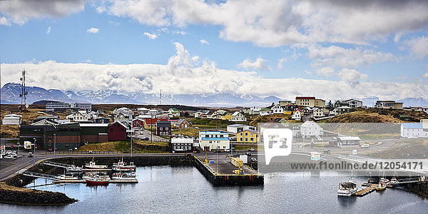 Colourful Houses And Small Boats In A Harbour  Snaefellsnes Peninsula; Iceland
